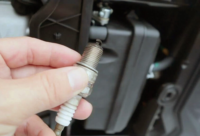 check and replace inverter generator spark plug.jpg