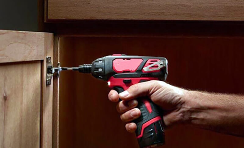 cordless-drill-drilling-hole.jpg