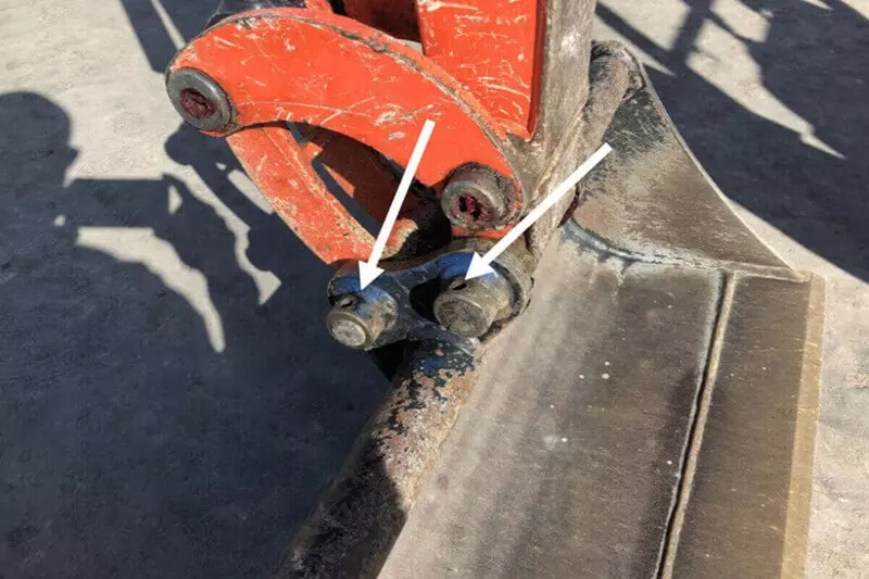 remove-old-buckets-from-mini-excavator.jpg